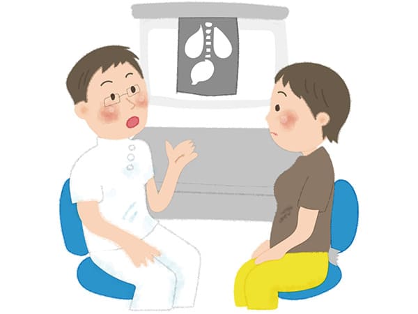 レントゲンの説明を聞く女性のイラスト